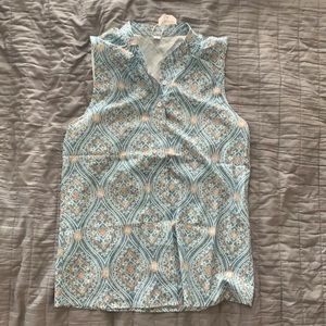 Multi-colored sleeveless top button-down top. Brand new.
